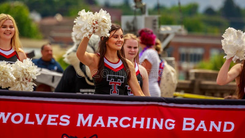 Portland, Oregon, USA - June 8, 2019: Tualatin High School Timberwolves Marching Band in the Grand Floral Parade, during Portland Rose Festival 2019. Portland, Oregon, USA - June 8, 2019: Tualatin High School Timberwolves Marching Band in the Grand Floral Parade, during Portland Rose Festival 2019