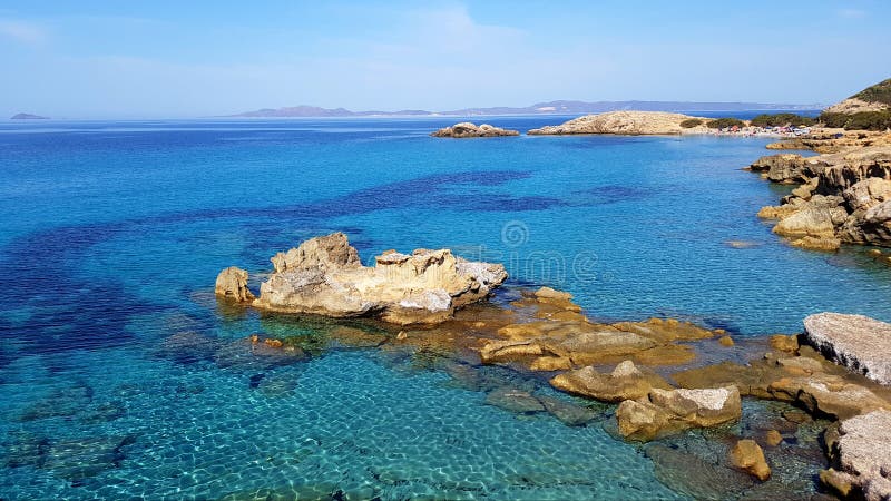 Porto Pinetto seascape crystal vatten för turkos i Sardinia, Italien royaltyfri fotografi Porto Pinetto seascape crystal vatten för turkos i Sardinia, Italien royaltyfri fotografi