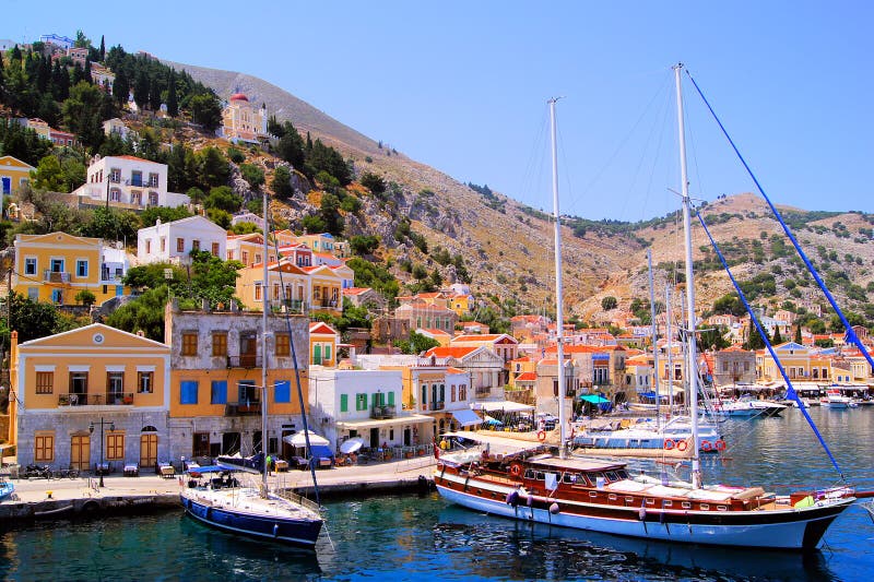 Porto a Symi, Grecia fotografia stock Porto a Symi, Grecia fotografia stock