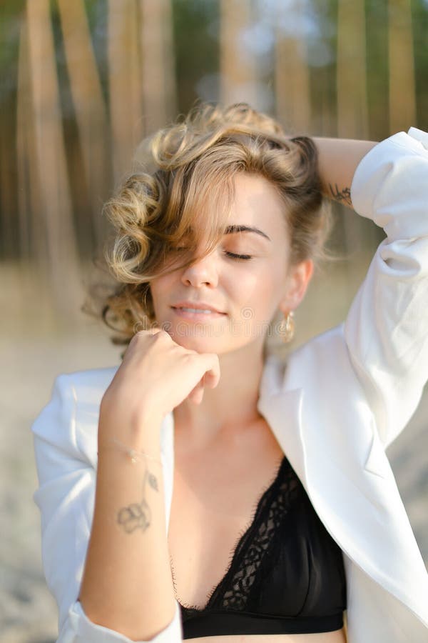 Portraint of Young American Woman with Little Hand Tattoo Wearing White  Shirt and Black Bra. Stock Photo - Image of modern, elegance: 161946060