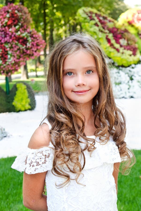 Portrait of Adorable Smiling Little Girl Child Outdoors Stock Photo ...