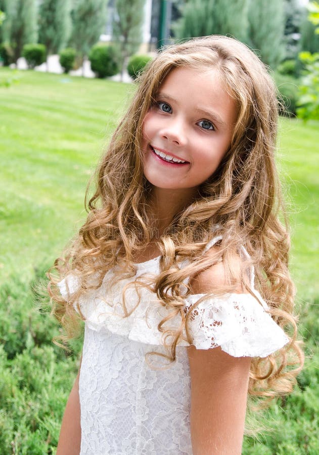 Portrait of Adorable Smiling Little Girl Child Outdoors Stock Photo ...