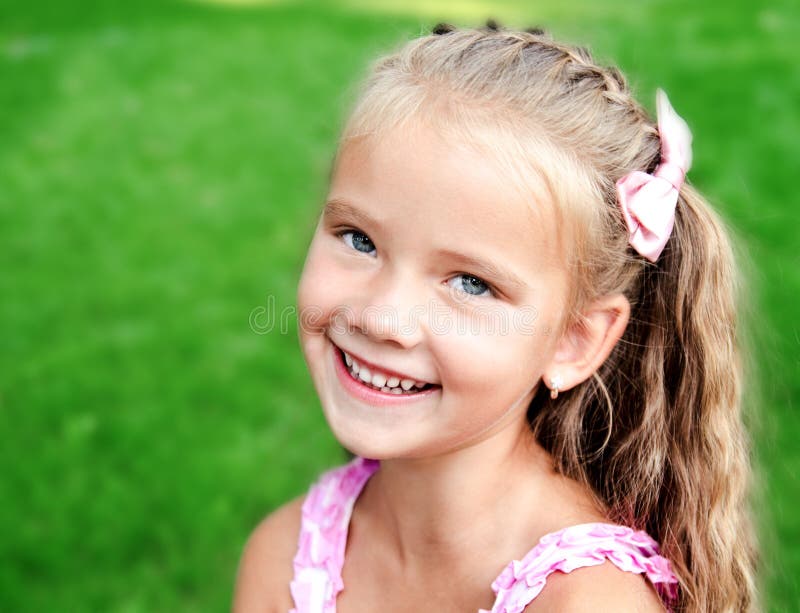 Portrait of Adorable Smiling Little Girl in the Park Stock Photo ...