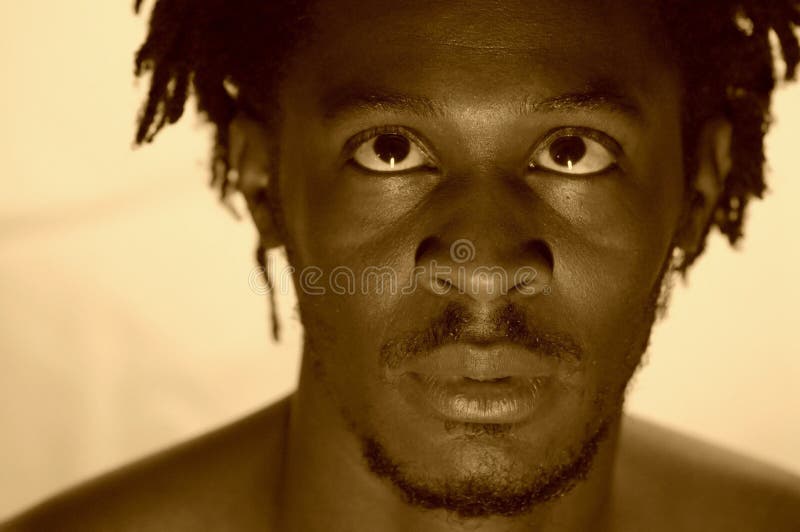 Portrait of an african expressing madness