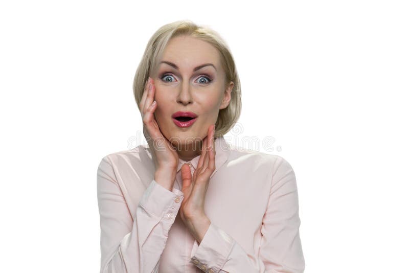Portrait of amazed mature lady in formal shirt. stock images Portrait of amazed mature lady in formal shirt. stock images