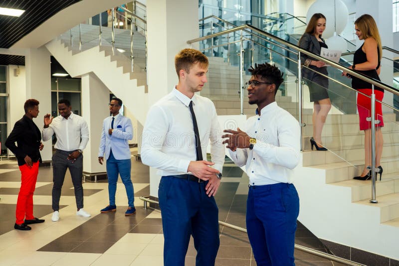 Portrait of ambitious business team diverse ethnicity multinational people in stylish suit getting communicating royalty free stock images Portrait of ambitious business team diverse ethnicity multinational people in stylish suit getting communicating royalty free stock images