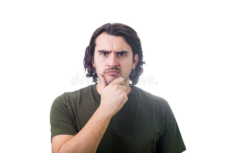 Portrait of angry and confused young man looking suspicious to camera isolated on white background. Puzzled and doubtful casual