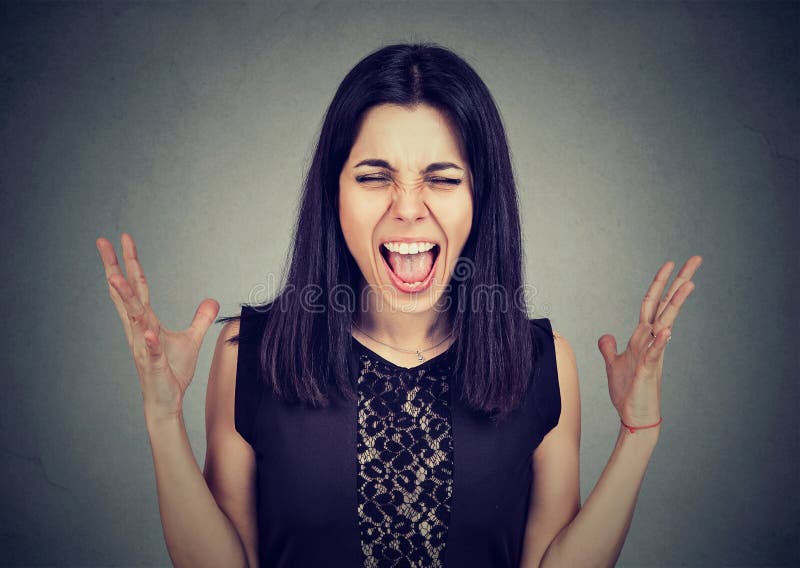 Portrait angry mad young woman screaming stock photos