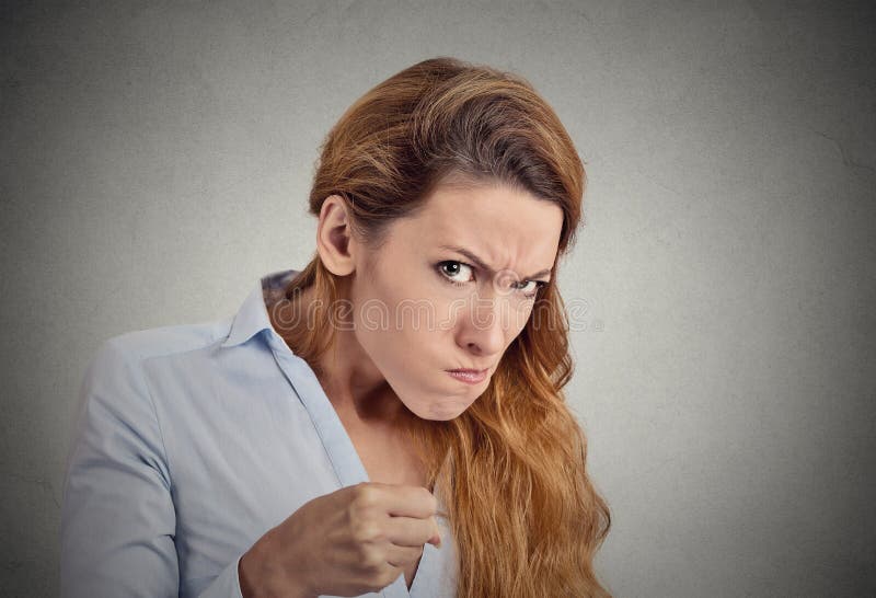 Portrait angry woman on grey background. Negative emotion royalty free stock photography
