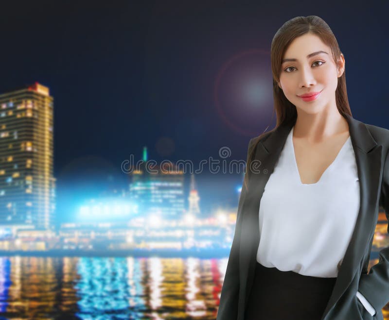 Portrait of an Business woman with Japanese Kobe Modern city with bright light building background stock photos