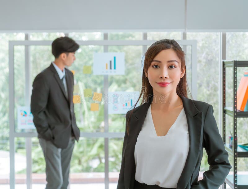 Portrait of an Business woman Standing on the foreground for leading ship and confidence concept stock image