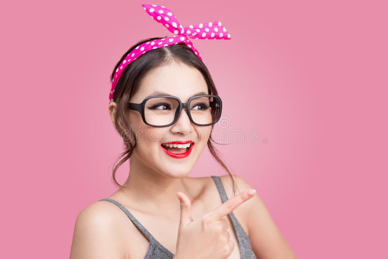 Portrait Of Asian Girl With Pretty Smile In Pinup Style Pointing Stock Image Image Of Style