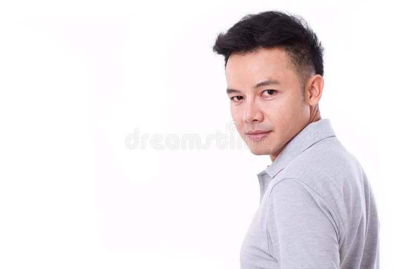 Portrait of asian man looking over his shoulder