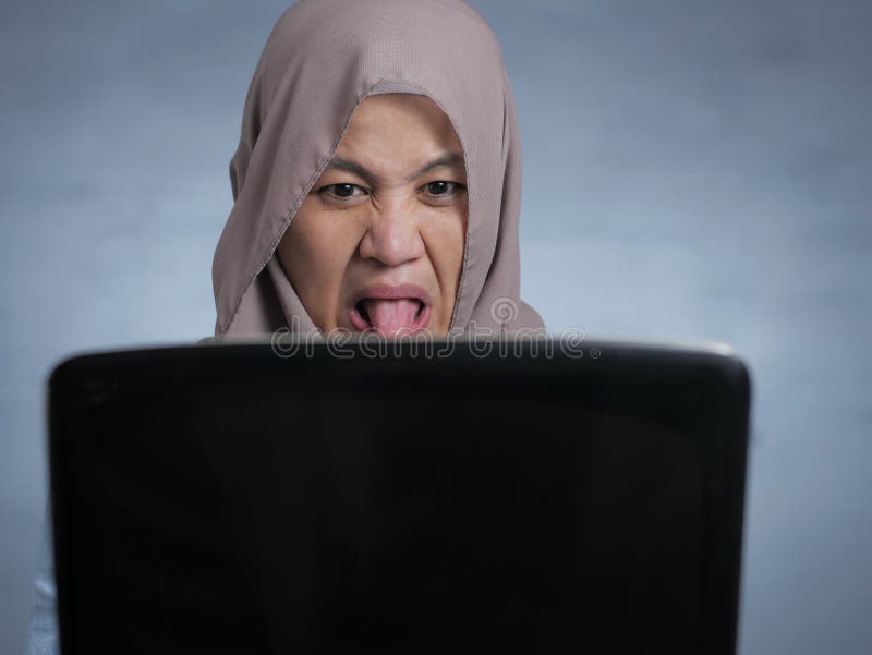 Asian Muslim - Muslim Woman Watching Disgusted Movie on Laptop Stock Image - Image of  fear, entertainment: 160117841