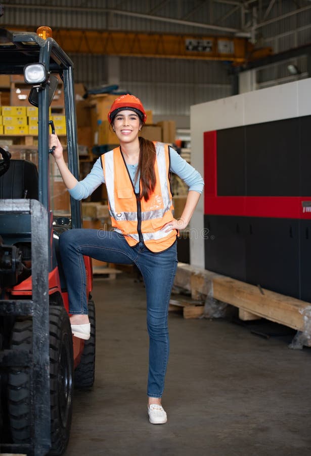 Portrait of an Asian Woman with a Forklift Used To Lift Heavy Objects ...