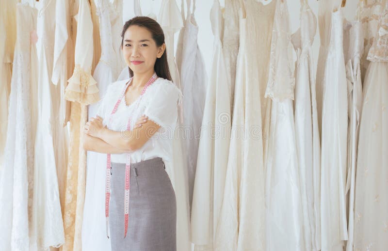 Woman In Business Dress  Standing And Smiling Stock Photo 