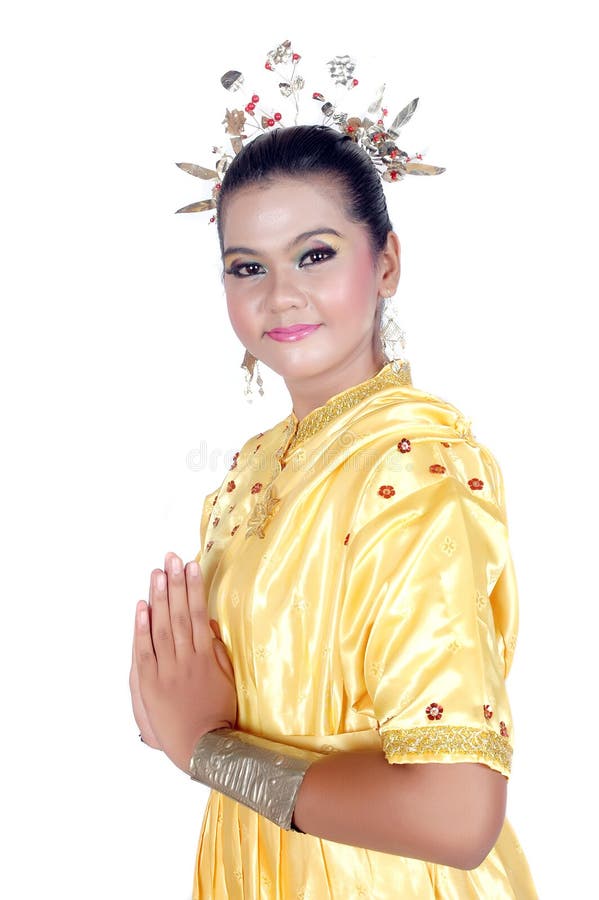 Portrait of an asian young girl dressed in traditional indigenous tribal borneo