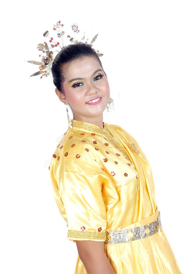 Portrait of an asian young girl dressed in traditional indigenous tribal borneo