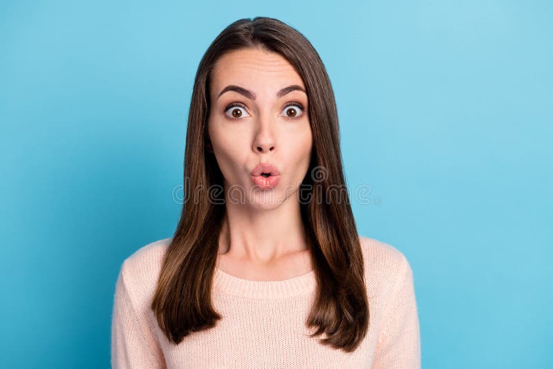 Portrait of astonished girl look in camera with open mouth wear winter outfit isolated over blue pastel color background