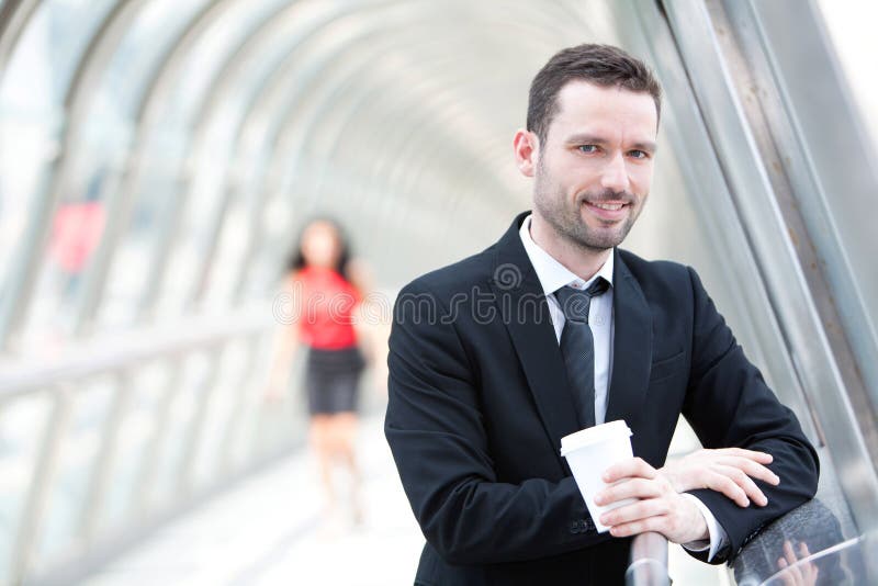 Portrait of an attractive businessman having a break