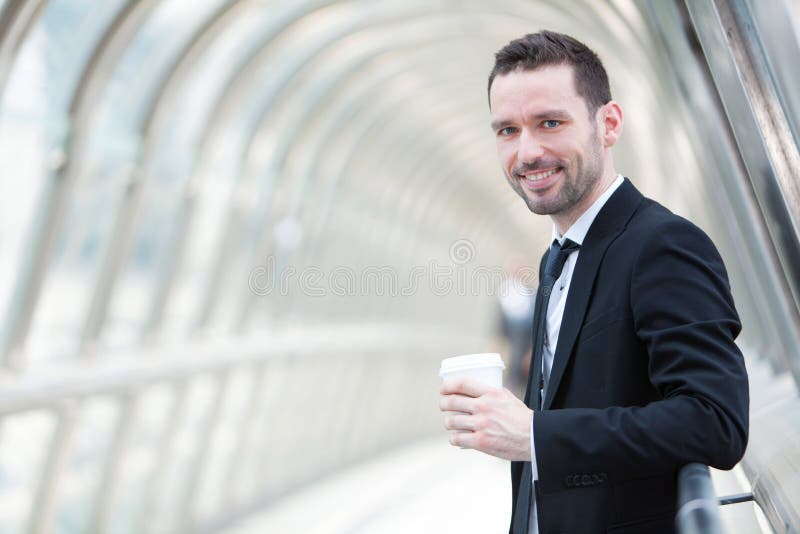 Portrait of an attractive businessman having a break