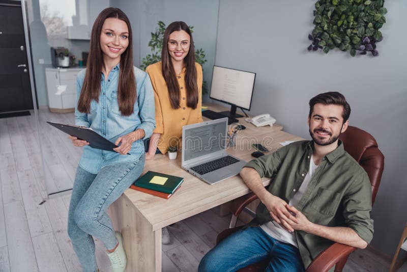 Portrait of attractive cheerful people marketing experts developing digital company creating strategy design at work royalty free stock photo