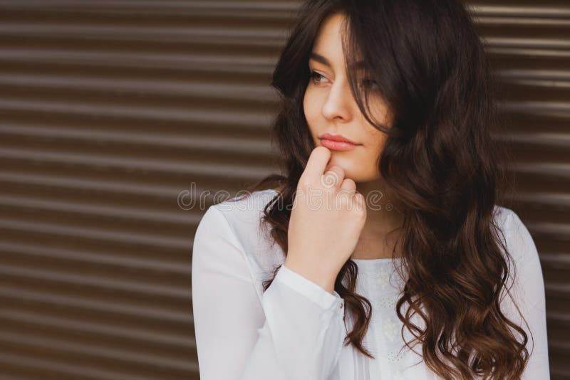 Portrait of an attractive fashionable young brunette woman. stock images Portrait of an attractive fashionable young brunette woman. stock images