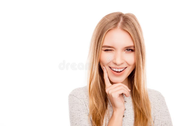 Portrait of attractive minded happy woman winking and flirting