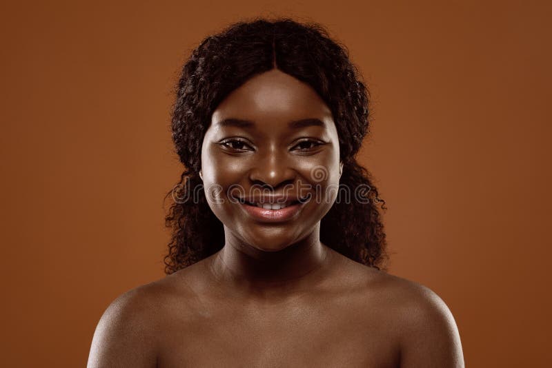 Portrait of Attractive Naked African Woman with Beautiful Smile on
