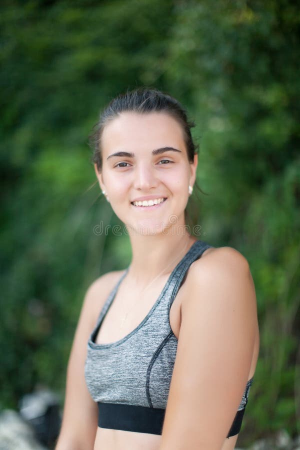 Portrait of attractive smiling girl in bikini top royalty free stock photography Portrait of attractive smiling girl in bikini top royalty free stock photography