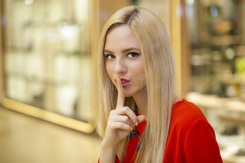 Portrait Of Attractive Young Blonde Woman With Finger On Lips Stock Image Image Of Hear Happy