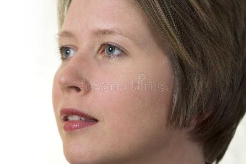 Portrait of an attractive young woman looking right