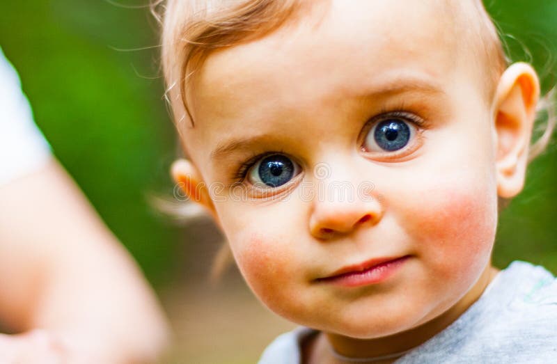 Baby Boy with Blue Eyes stock photo. Image of purity 119243092