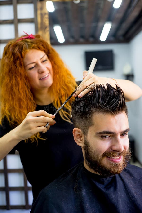 Barber with scissors stock image. Image of client, blade 99136861