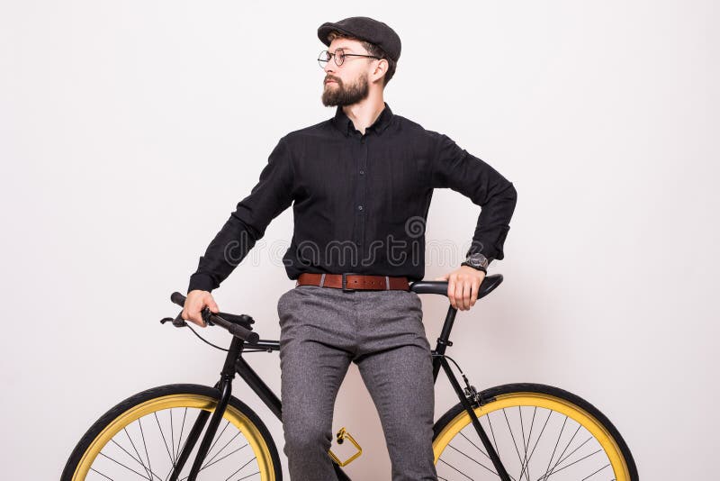 Bearded Man with a Fixie Bicycle. Low Angle View of Confident Young Bearded  Man Carrying His Bicycle on Shoulder and Looking at Stock Photo - Image of  caucasian, people: 136857266