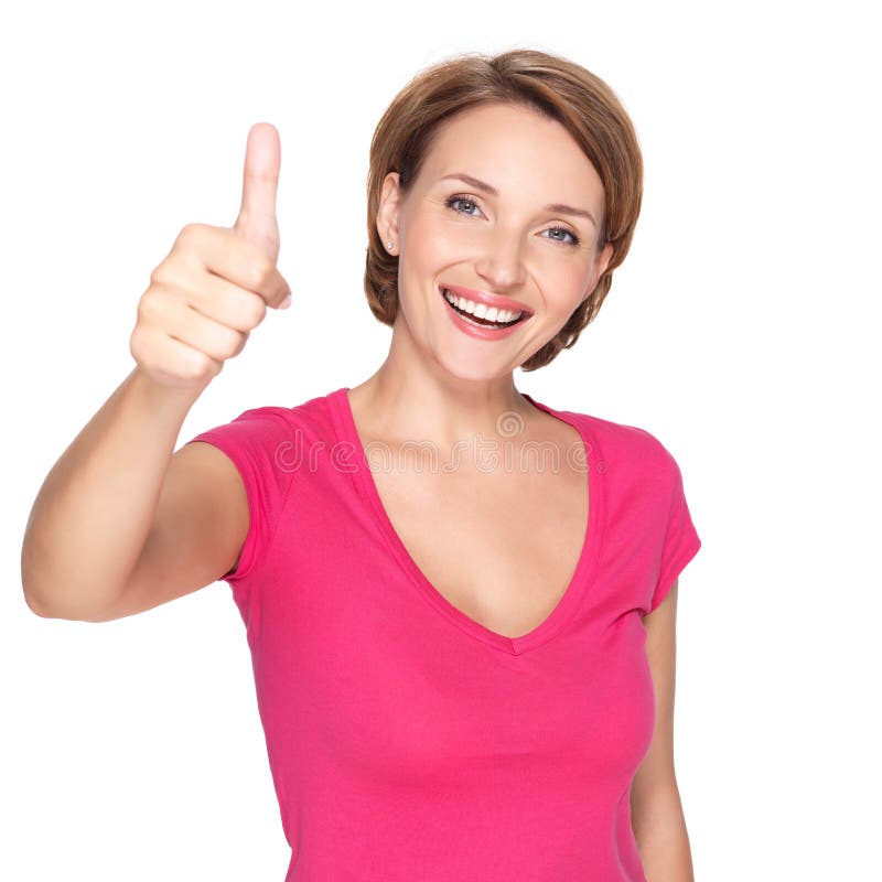 Portrait of a beautiful adult happy woman with thumbs up sign