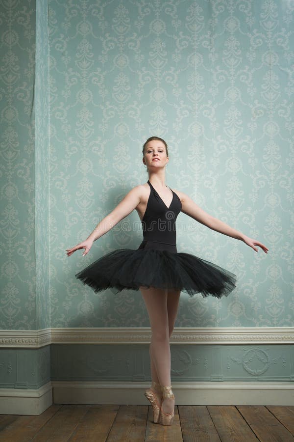 Beautiful Ballerina in Dance Pose stock photography