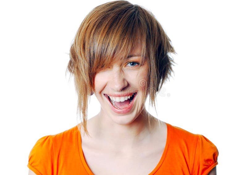 Portrait of a beautiful blonde female laughing isolated over a white background