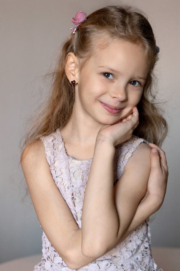 Portrait Of A Beautiful Blonde Girl In A Pink Dress Stock Image Image Of Angelic Look 235269595 