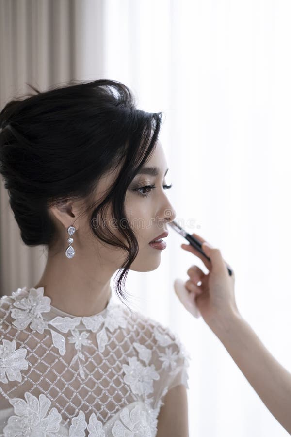 Portrait of Beautiful Bride with Beautiful Hairstyle. Makeup Artist Working with Young Bride. Gorgeous Bride with Fashion Makeup. Stock Image - Image of hair, bridal: 215347399 Portrait of Beautiful Bride with Beautiful Hairstyle. Makeup Artist Working with Young Bride. Gorgeous Bride with Fashion Makeup. Stock Image - Image of hair, bridal: 215347399