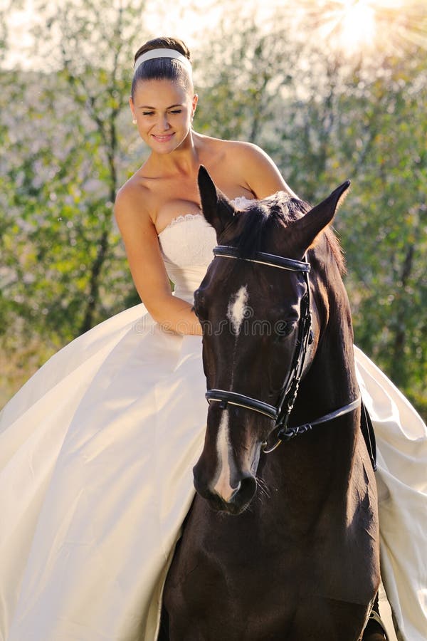 Portrait of beautiful bride with horse royalty free stock photos
