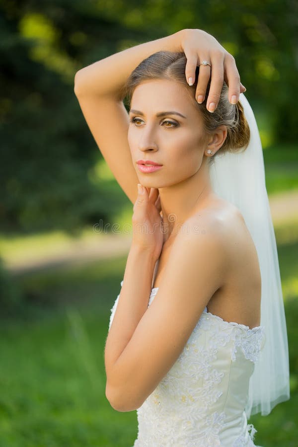 Portrait of a beautiful bride in the park royalty free stock photos Portrait of a beautiful bride in the park royalty free stock photos