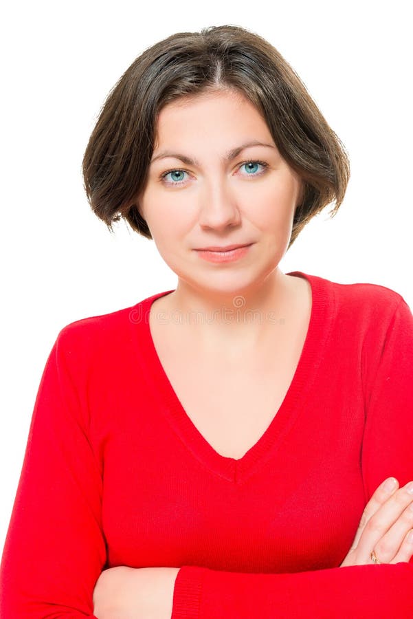 Portrait of a beautiful brunette in a red sweater