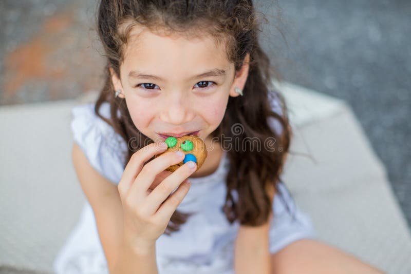 Portrait of beautiful, child (girl), bitescookies