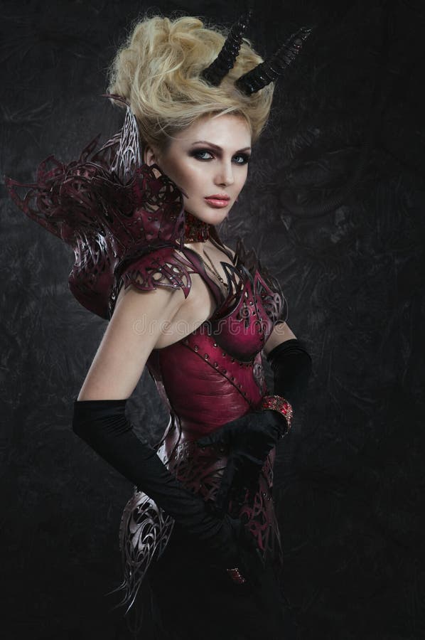 Portrait of Beautiful Devil Woman in Dark Dress Stock Photo - Image of