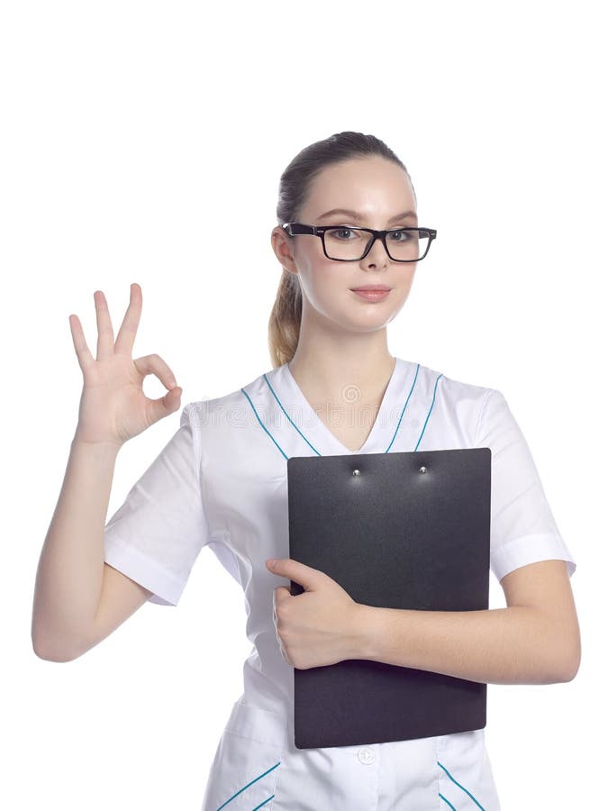 Portrait of a beautiful female student in a medical suit wearing stock image Portrait of a beautiful female student in a medical suit wearing stock image