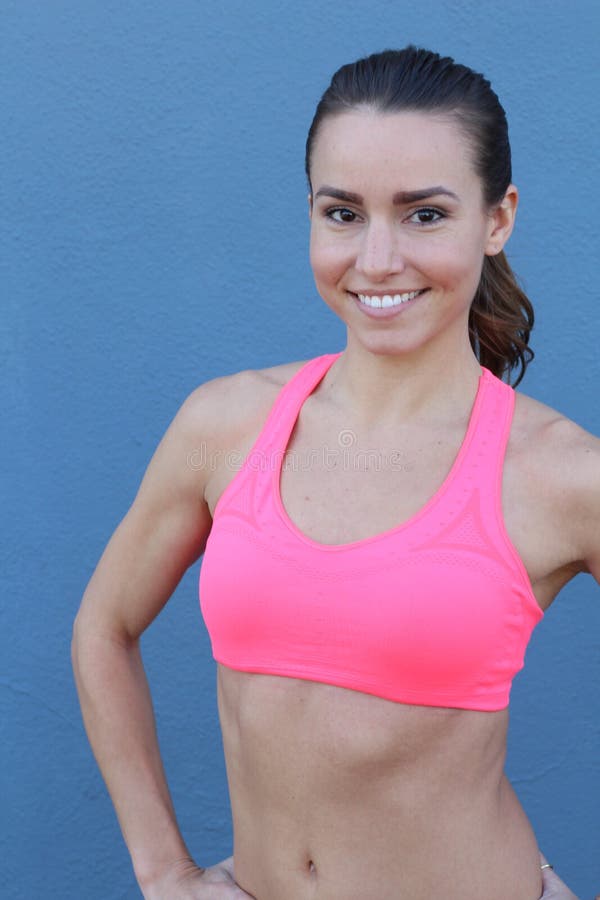 Portrait of a beautiful fit young brunette woman stock photo Portrait of a beautiful fit young brunette woman stock photo