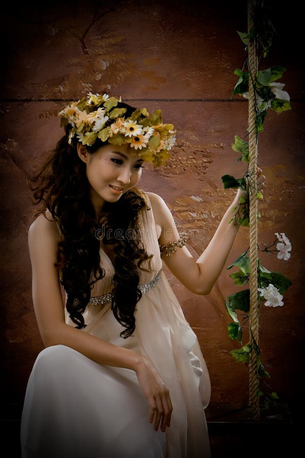 Portrait of beautiful girl in antique dress