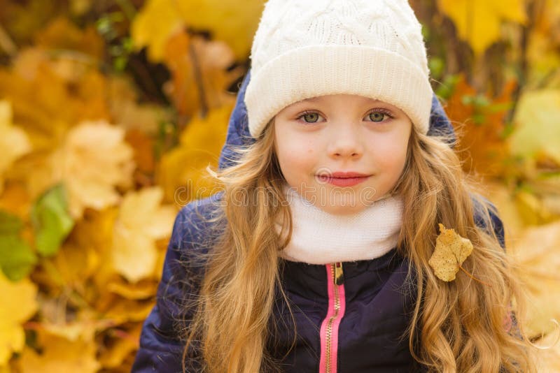 Portrait of a Beautiful Girl in a Blue Coat Outdoors in Autumn Stock ...