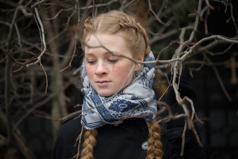 Portrait of a beautiful girl in the bush outdoors